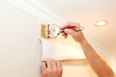 Pose de papier peint à la Noë-Poulain — revêtements muraux et toiles de verre